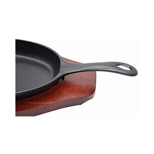 https://assets.dragonmart.ae//pictures/0209548_oval-shaped-cast-iron-fajita-pan-with-sizzling-plate-24cm-black.jpeg