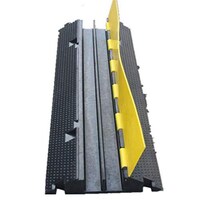 Picture of Modular Rubber Traffic Speed Bump with Reflective Beads, Black & Yellow