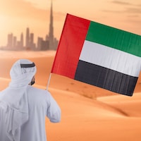 Picture of UAE Hand Waving Large Flag With Stick
